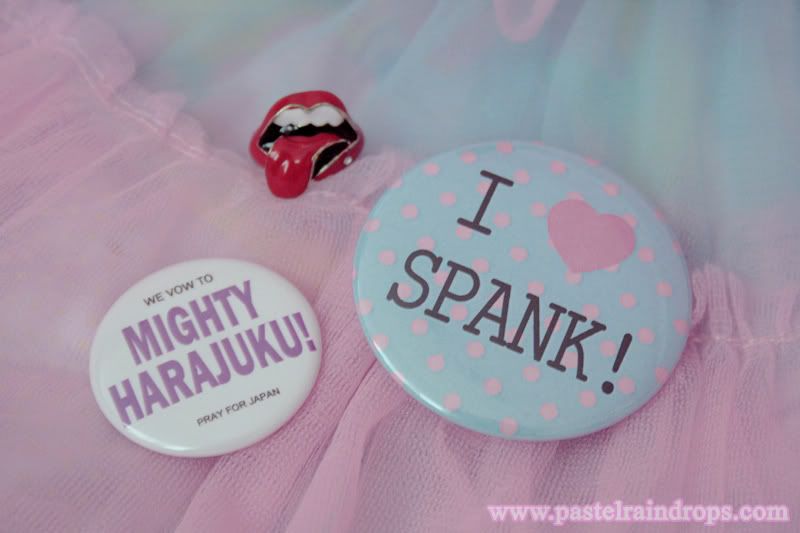A lip ring a Mighty Harajuku button from Haru and a Spank button 