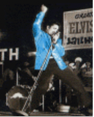 ANIMATED 300 VIDEO ELVIS BLUE JACKET SINGING DANCING ON OUTDOOR STAGE 1957 photo ANIMATED 300 VIDEO ELVIS DANCING BLUE JACKET OUTDOOR STAGE 1950sNEW NEW_zpsv34jj7tj.gif