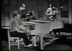 ANIMATED 300 VIDEO GIF JERRY LEE LEWIS PLAYING WITH HIS BAND photo ANIMATED 300 VIDEO GIF JERRY LEE LEWIS PLAYING WITH BAND ON PIANO STRIPED BLACK WHITE SHIRT NEW NEW_zps30ghjeiu.gif