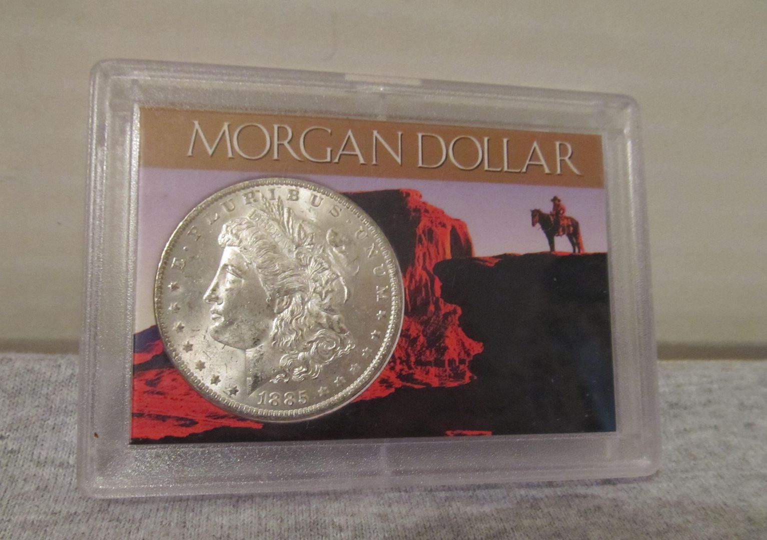 silverdollar,silvercross 1885 o morgan silver dollar
